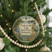 A round ornament hanging on a Christmas tree, featuring a scenic image of Taylorville Lake State Park, Kentucky.
