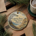 A round ornament with a scenic landscape of Torrey Pines State Natural Reserve, California, featuring a pine tree and a body of water.
