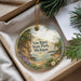 A decorative ornament with a scenic landscape of Van Riper State Park, Michigan, featuring a lake, pine trees, and a rocky cliff.