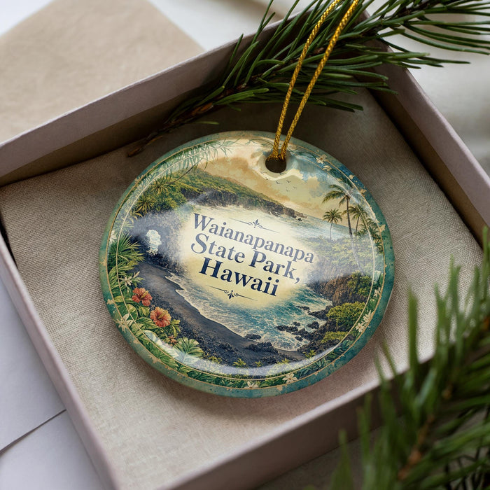 A decorative ornament with a scenic image of Waianpanapa State Park in Hawaii, featuring a tropical landscape with palm trees, water, and a waterfall.