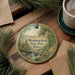 A decorative ornament with a scenic landscape of Weinberg-King State Park, Illinois, featuring a waterfall and pine trees.