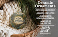Ceramic ornaments, featuring a scenic image of Wendell State Forest, Massachusetts, hanging from a wicker basket.