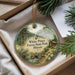 A decorative ornament with a scenic image of White Pines Forest State Park, Illinois, hanging from a string.