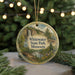 A circular ornament with a scenic landscape of Whitewater State Park, Minnesota, featuring a waterfall, forest, and a road.