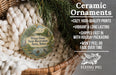 Ceramic ornaments, specifically a Wilson Island State Recreation Area ornament, are displayed in a basket with pine branches. The ornament features a scenic image of a lake and a bird. The text highlights the ornament's features, such as being cozy, high-quality, and long-lasting, and mentions that it is shipped fast and comes with holiday packaging. The image also includes a scale for the ornament, indicating it is 2.8 inches in size.