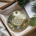A decorative ornament with a scenic landscape of Wind Creek State Park, Alabama, featuring a waterfall, pine trees, and a cabin.