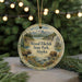 A circular ornament featuring a scenic landscape with moose and bears, surrounded by pine trees and mountains, with the text "Wood-Tikchik State Park, Alaska" displayed prominently.
