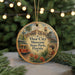 A circular ornament featuring an illustration of a trolley car and a building, with the text "Ybor City Museum State Park, Florida" prominently displayed.