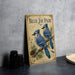 A vintage-style metal sign featuring illustrations of two blue jays perched on a branch, with text describing the birds.