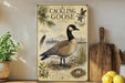 a vintage-style illustration of a Canadian goose, with a wooden cutting board and other kitchen items in the foreground.