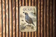 A vintage-style metal sign with illustrations and text, mounted on a wooden wall.