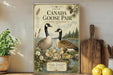 A vintage-style advertisement for a Canadian goose pair, featuring illustrations of two adult geese and their young ducklings in a natural setting.