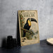 A vintage-style poster or book cover featuring a colorful illustration of a toucan bird, with text and decorative elements.