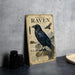 a vintage-style illustration of a raven, with detailed illustrations of the bird and its natural habitat.