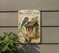 a vintage-style sign for the Eastern Bluebird Pair at the Nest Box, with illustrations of the bluebirds and a wooden birdhouse.
