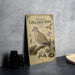 a vintage-style illustration of a collared-doose, a type of dove, with detailed illustrations and text providing information about the bird.