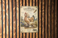 a vintage-style poster of a chicken, with a wooden background and decorative elements.