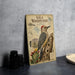 A framed illustration of a gila woodpecker, featuring detailed illustrations of the bird and its natural habitat, is displayed on a wall.