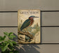 A vintage-style metal sign featuring a detailed illustration of a green heron, with text providing information about the bird species.