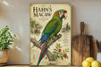 A vintage-style poster of a colorful parrot, specifically a macaw, is displayed on a wall next to a wooden cutting board and some potted plants.