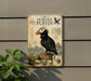 a vintage-style metal plaque with illustrations and text about the horned puffin, a bird species native to the Arctic region.