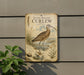 a metal sign with a bird illustration, mounted on a wall next to a plant.