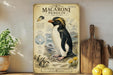 a vintage-style poster of a macaroni penguin, with a detailed illustration of the penguin and its natural habitat. The poster is displayed on a wooden shelf, surrounded by various kitchen utensils and a potted plant.