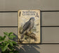 a detailed illustration of a Northern Goshawk, a bird of prey, perched on a branch. The bird is depicted in a realistic manner, showcasing its distinctive features such as its sharp talons, keen eyesight, and powerful wings. The illustration is set against a backdrop of a forest, providing a natural habitat for the bird. The image is framed by a border, and there is a plant visible to the left of the frame.