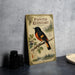 a vintage-style book cover for "Painted Redstart" by Parulidae, with a detailed illustration of a redbird perched on a branch.