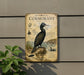 a metal sign with illustrations and text about a pelagic cormorant, a type of sea bird.