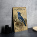 A vintage-style metal sign featuring an illustration of a blue jay bird, with text and decorative elements.
