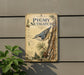 a vintage-style metal sign with illustrations of a bird perched on a tree trunk, surrounded by pine cones and pine needles.
