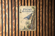 a poster or flyer for the Pygmy Nuthatch, which is a small songbird. The poster has a detailed illustration of the bird perched on a tree trunk and includes text providing information about the Pygmy Nuthatch.