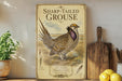 a vintage-style poster of a sharptail grouse, a type of bird, displayed on a shelf next to a wooden cutting board and some kitchen utensils.