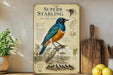 a poster of a Superb Starling, a bird species, with illustrations and text providing information about the bird.