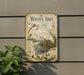 a vintage-style metal plaque depicting a white ibis bird, with a detailed illustration and accompanying text.