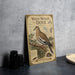 a vintage-style illustration of a white-winged dove, accompanied by text and a bird illustration, all set against a gray background.