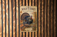 A vintage-style poster of a wild turkey in an autumn forest, displayed on a wooden wall.