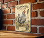 A vintage-style metal sign featuring an illustration of a Wyandotte chicken, mounted on a brick wall.