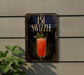 a sign for a cocktail called "151 Swzzle" with a picture of a red drink and a green leaf garnish.