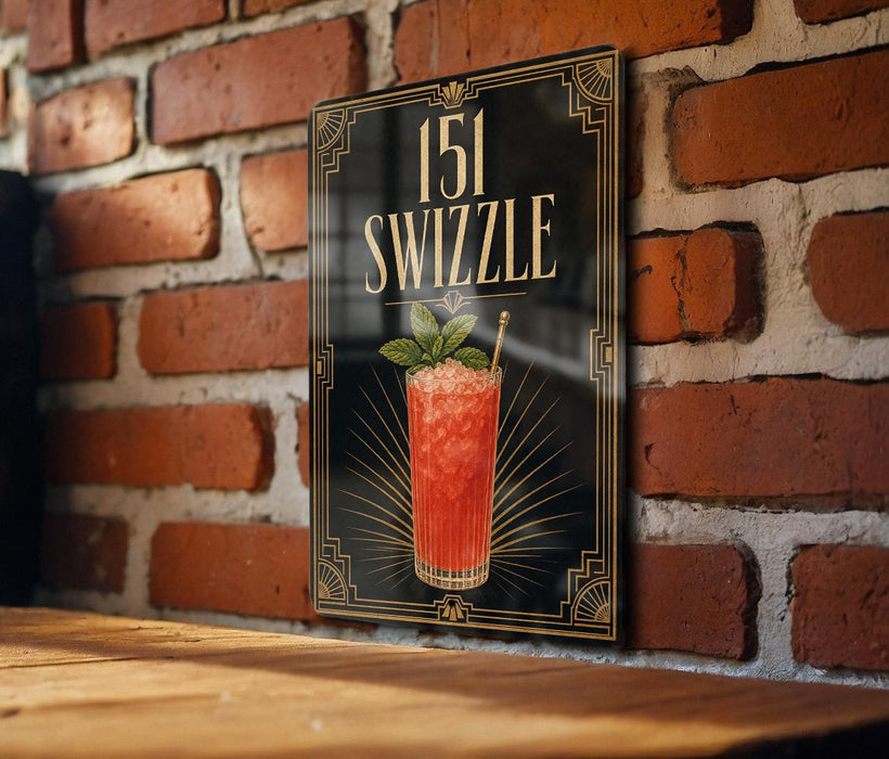 A framed illustration of a cocktail called "151 Swzzle" is displayed on a brick wall.