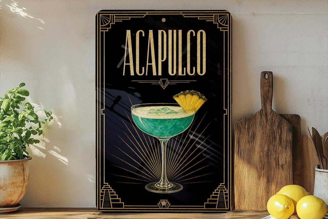 a decorative sign with the word "ACAPULCO" on it, along with an illustration of a cocktail glass and a lemon. The sign is placed on a wooden surface, and there are some potted plants and kitchen utensils visible in the background.