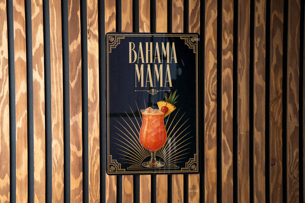 A sign for a tropical drink called "BAHAMA MAMA" is displayed on a wooden wall.