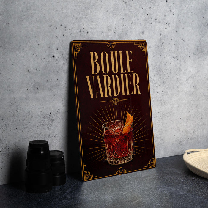 A decorative sign for "Boule Vardier" cocktail, featuring an illustration of a cocktail glass with an orange slice.