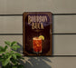 A sign for "Bourbon Buck", featuring an illustration of a cocktail with ice and a lemon slice.