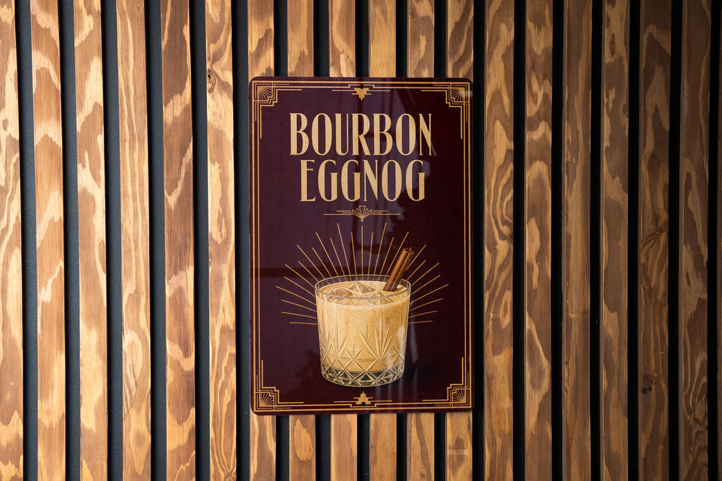 A sign for "Bourbon Eggnog" is displayed on a wooden wall.