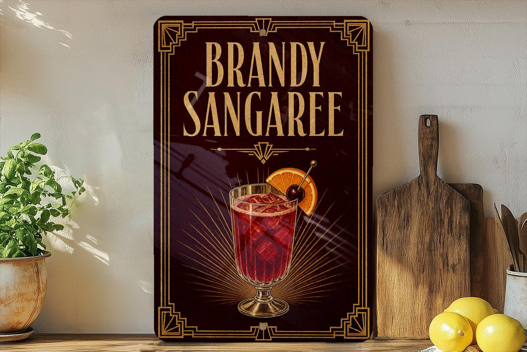 A decorative sign for "Brandy Sangaree" is displayed on a wooden shelf, accompanied by a potted plant, a cutting board, and some lemons.