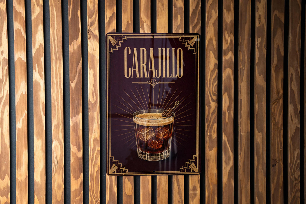 a sign for a drink called "Carajillo" with a glass illustration and ice cubes.