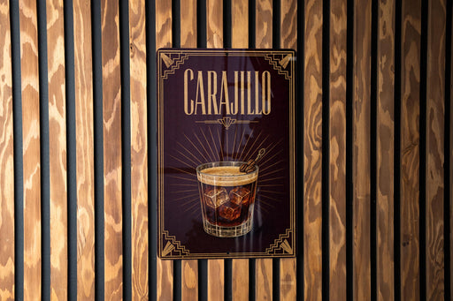a sign for a drink called "Carajillo" with a glass illustration and ice cubes.