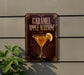 A sign for a caramel apple martini, featuring an illustration of a martini glass with a slice of apple on the side.